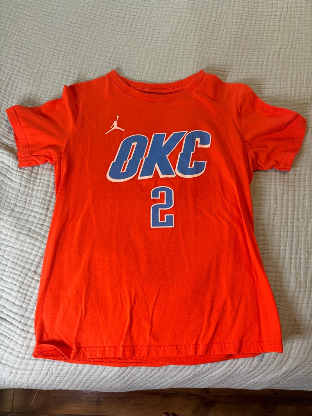 Jordan Orange OKC Youth Tee with Blue Graphics
